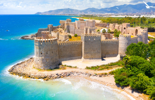 Secluded beach and town walls in Turkey
