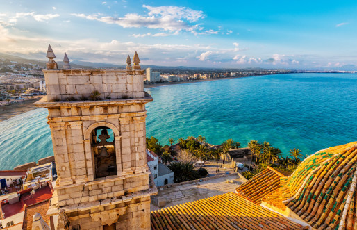 Beautiful Mediteranean coast town aerial view with an old tower